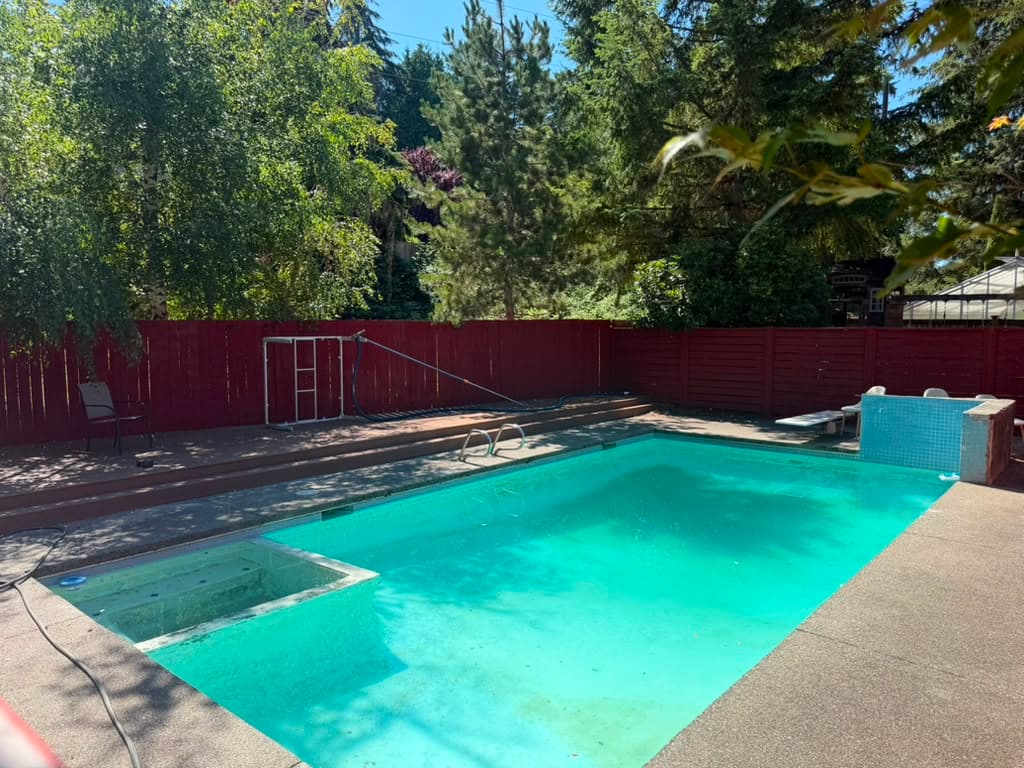Backyard pool area at Victory Gardens Adult Family Home