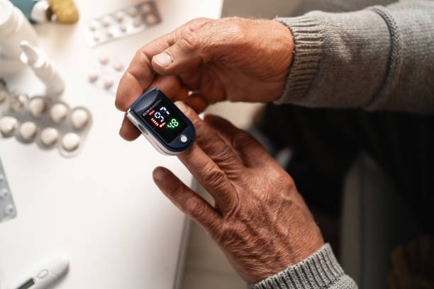 Caregiver monitoring a resident's health and wellness